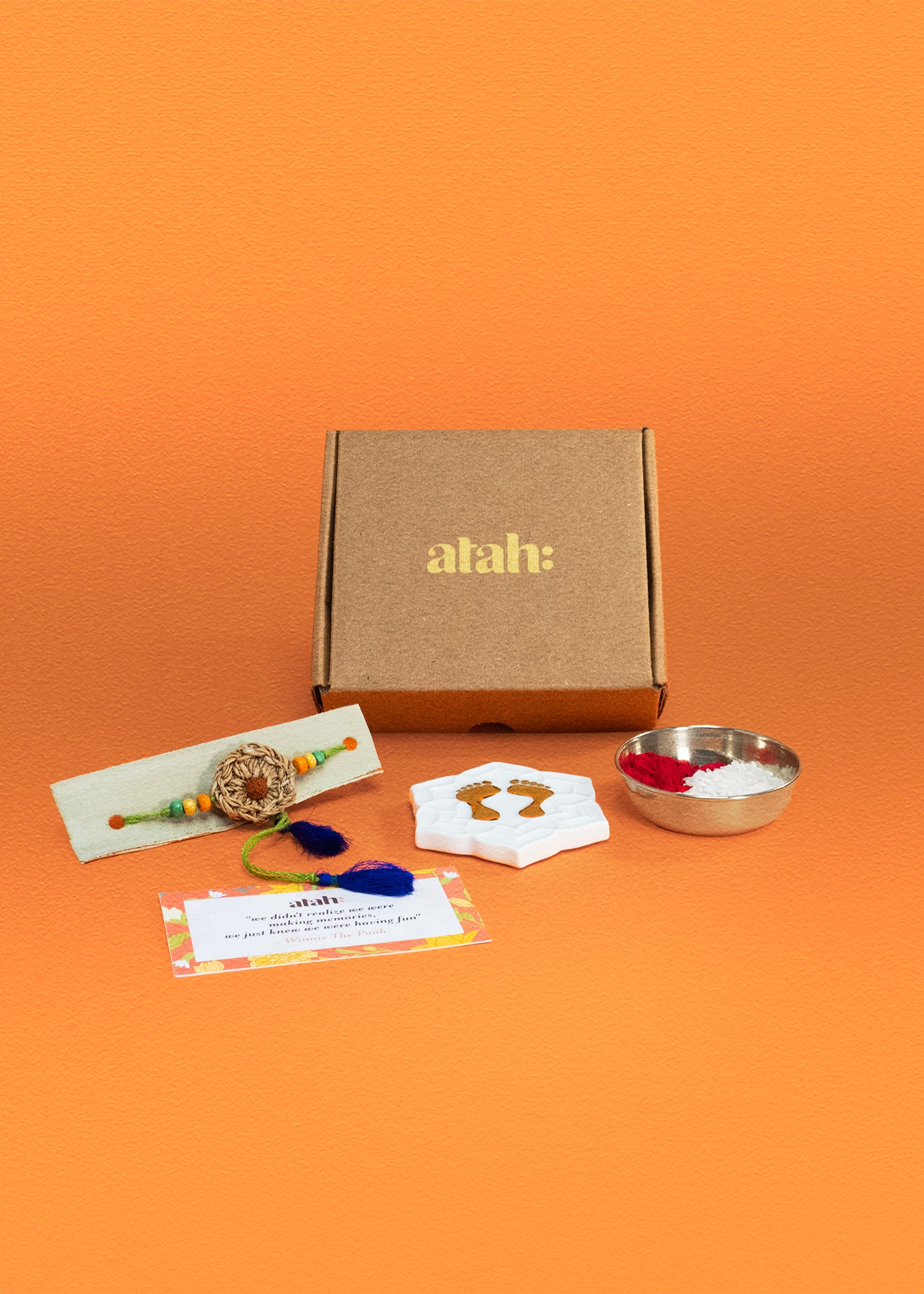 Blissful Ties: Rakhi Gift Hamper with Alluring Porcelain Lakshmi Charan